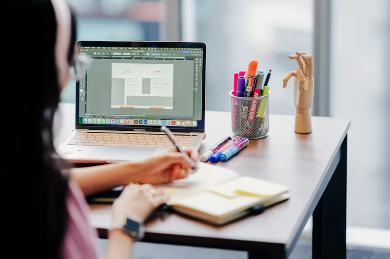 Business owner reviewing a website with a designer